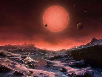 Pri chladnej hviezde objavili tri obývateľné planéty