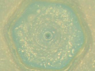 See Saturn's magical color-changing north pole     - CNET