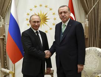 Erdogan a Putin diskutovali telefonicky o situácii v Sýrii