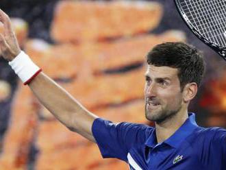Djokovic into Australian Open quarter-finals after beating Medvedev