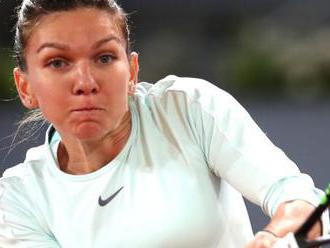 Halep wins 6-0 6-0 to reach last eight in Madrid