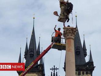 Prague Catholic statue torn down by mob rises again