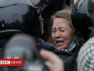 In pictures: Tens of thousands gather for pro-Navalny protests