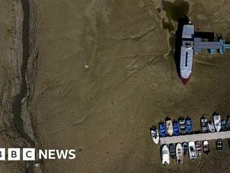 Drought leaves boats stranded on dried-up river bed along French-Swiss border