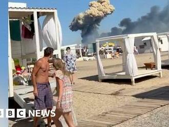 Crimea beachgoers run after airfield explosion